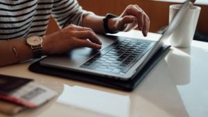 student working from home on laptop