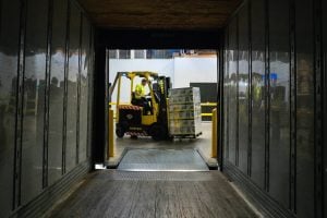 Forklift moving packages