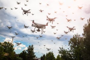 A swarm of drones in the sky.