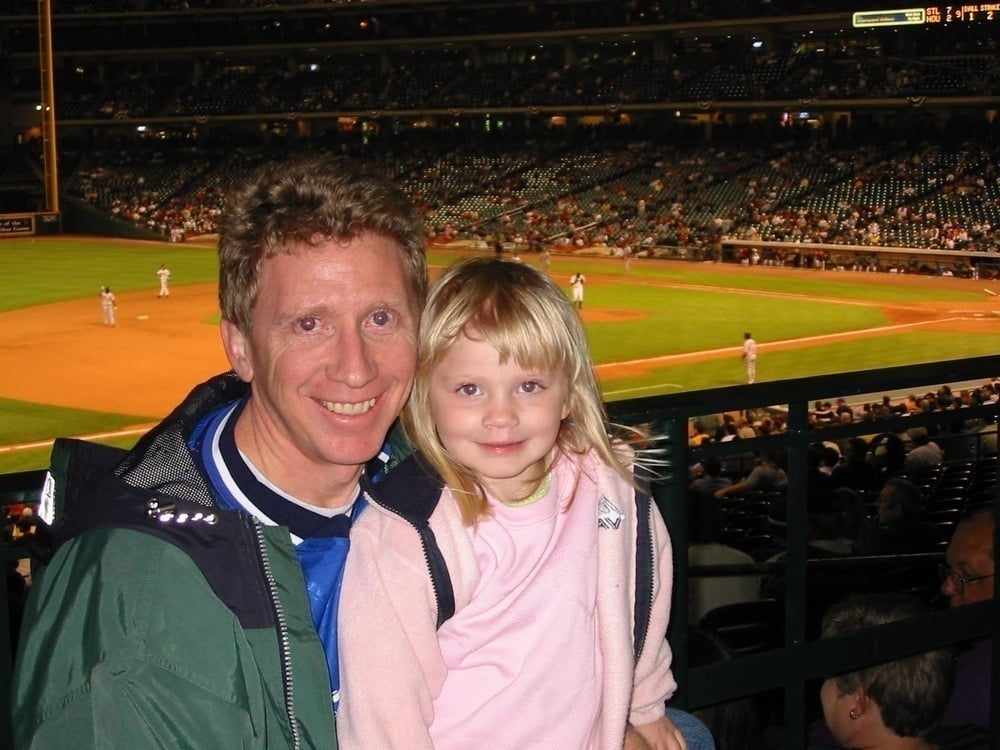 Photo from the past: Don Grage and a very young Casey Qadir pose for a photo at a baseball game. 