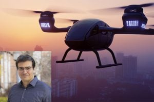 A 3D rendering of a quadcopter above a city at sunset. Inset: a headshot photograph of Jaafar El-Awady