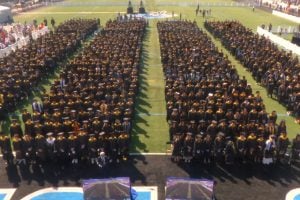 image of master's Class of 2026 seated on Homewood Field